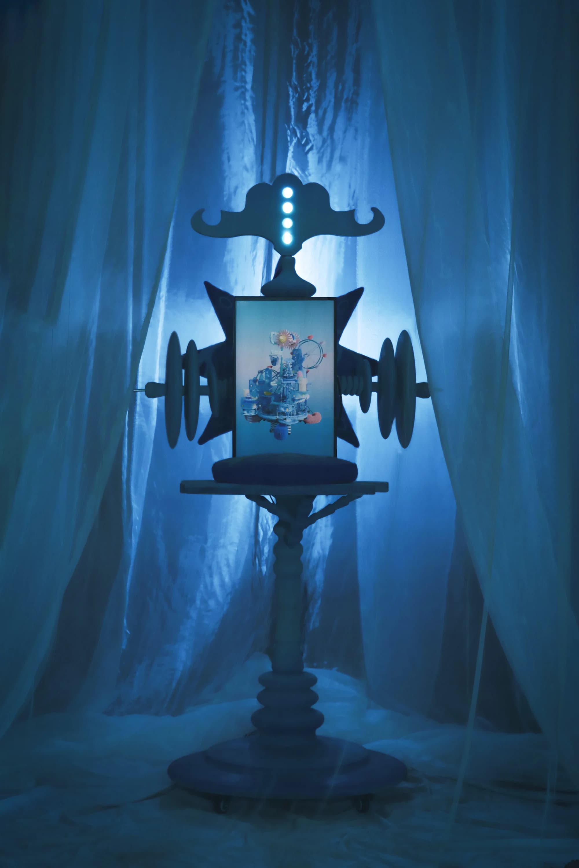 Sleep Town viewed through a translucent blue window installation